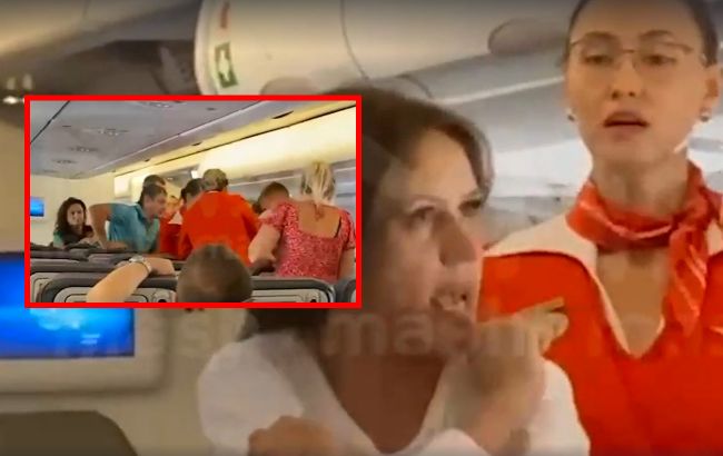 Росіянка влаштувала п’яний дебош у літаку: її зв’язували скотчем (відео)